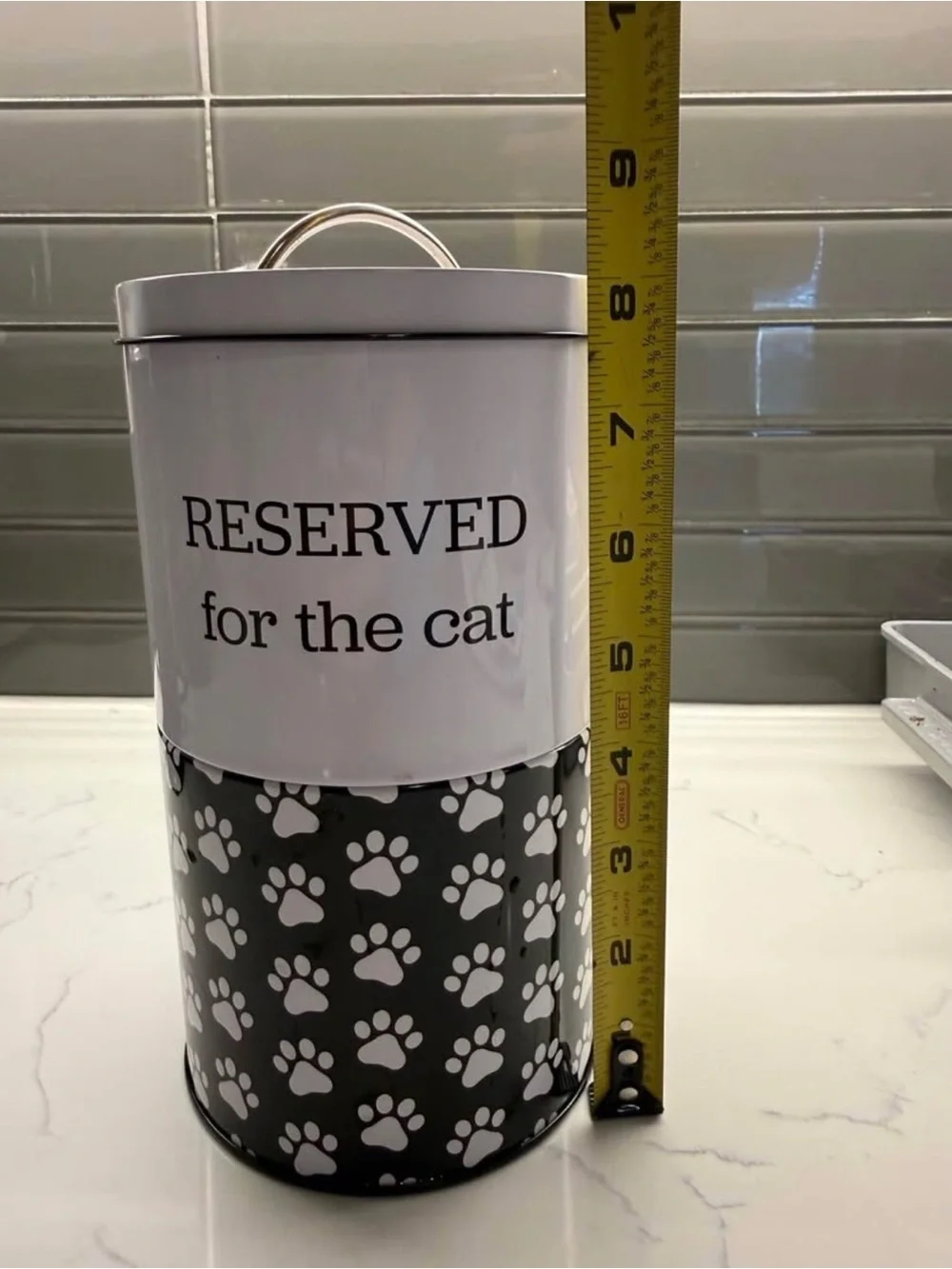“Reserved for the cat” treat holder